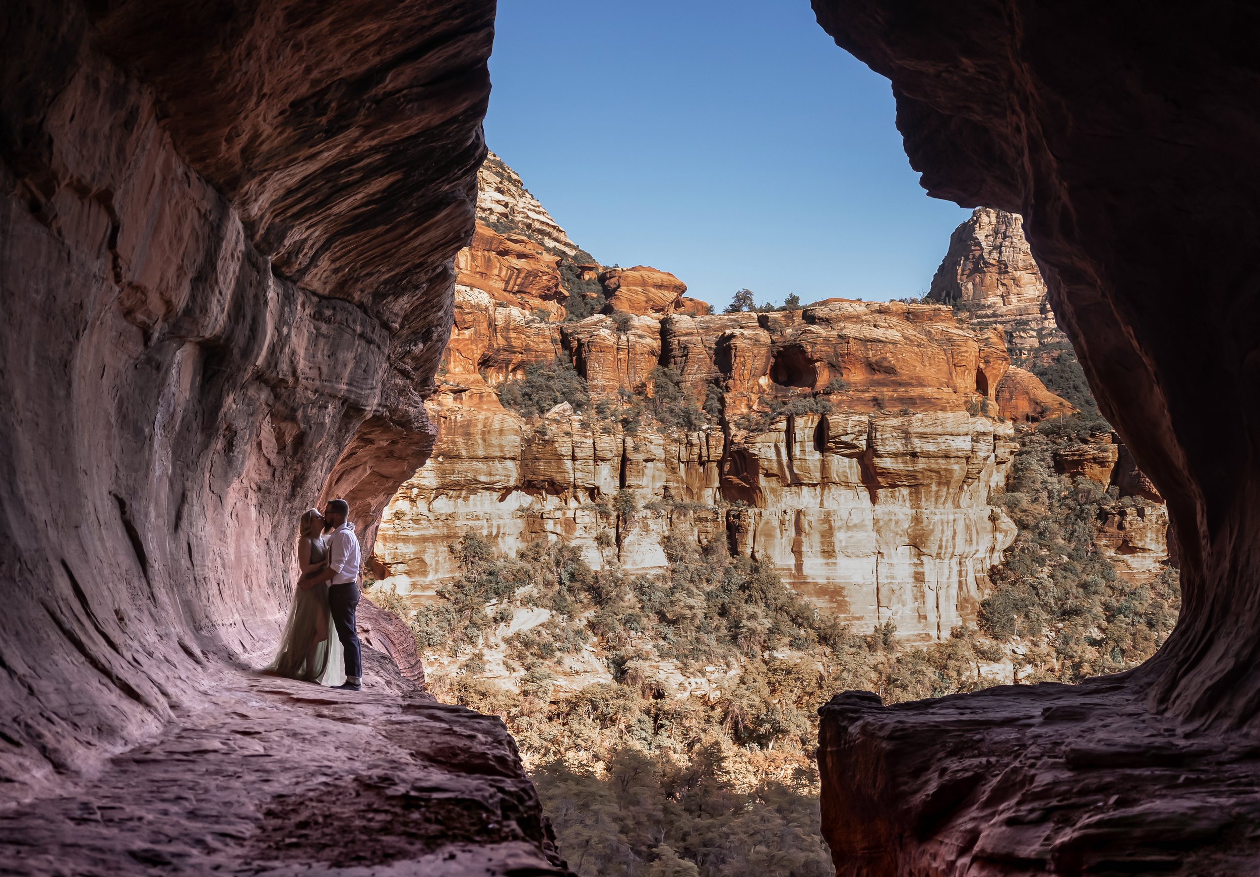 Escape to the breathtaking views in Subway tunnel in Sedona. A very good spot to have an engagement photo. Taken by Kollar Photography Arizona Elopement Photographer.  