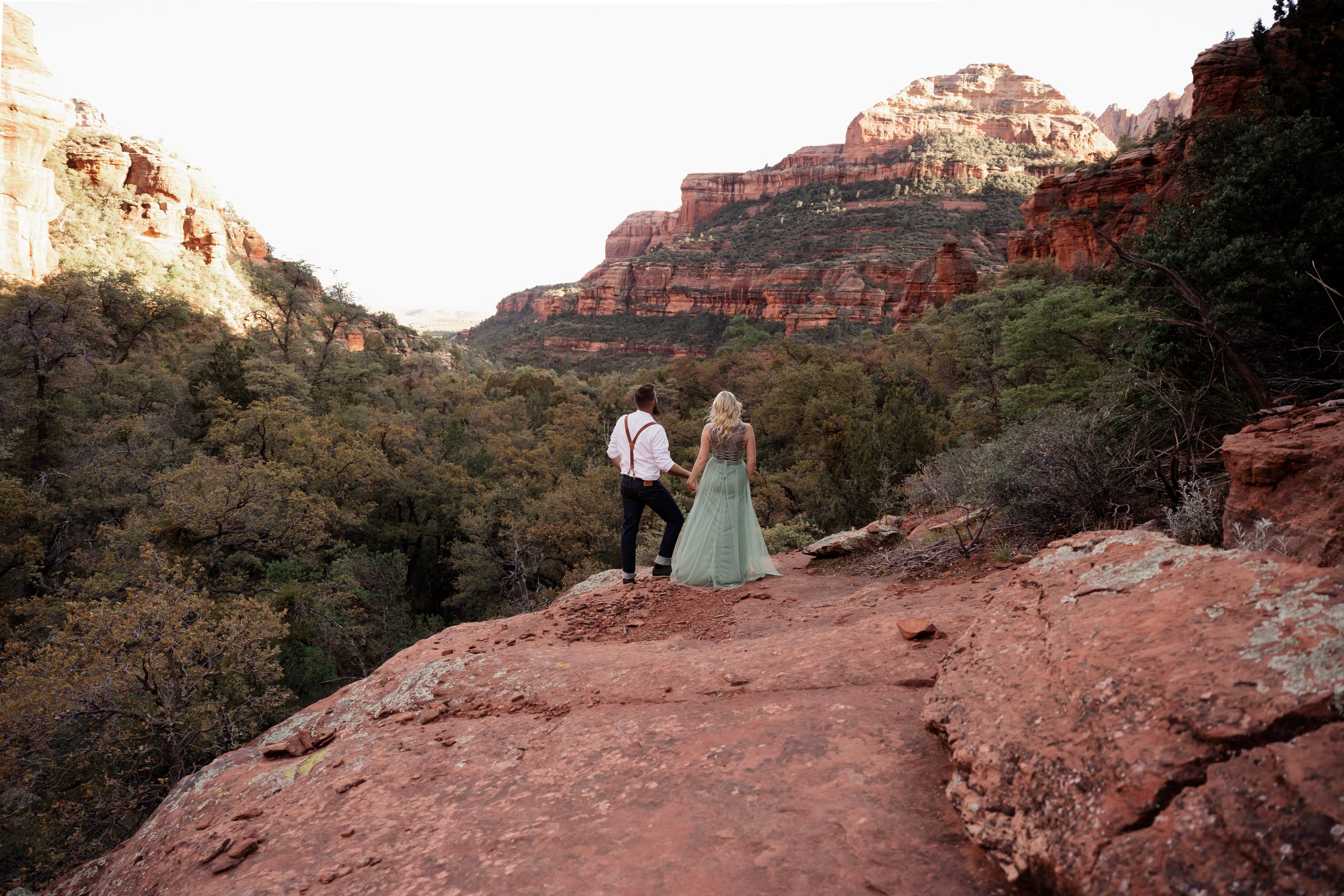 A couple during an engagement session in Sedona, Arizona. Photo taken by kollar photography Arizona Elopement photographer.