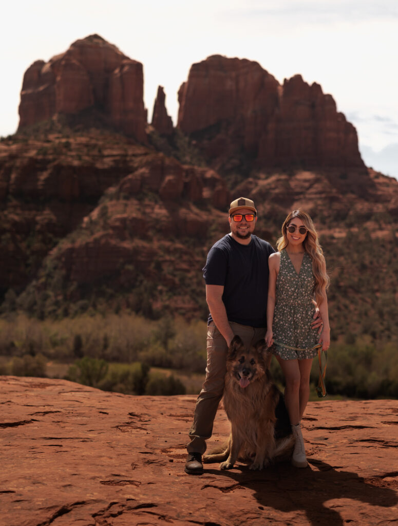 A photo of a couple with their dog in Sedona, Arizona. Photo taken by Kollar Photography. 